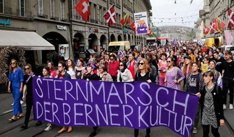 The purple wave sweeps over Switzerland as women protest on inequality